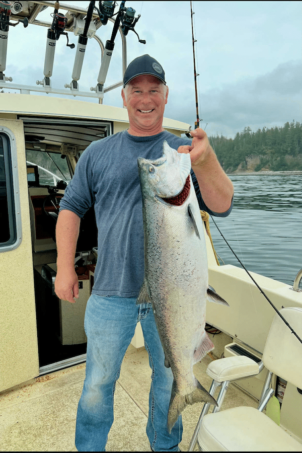 Rick Jakimchuk with a fresh caught West Coast Chinook salmon