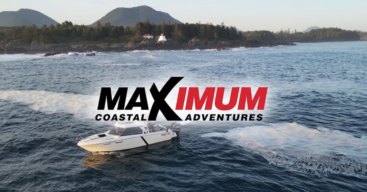 Maximum Coastal Adventures Boat on water near Ucluelet coastline.