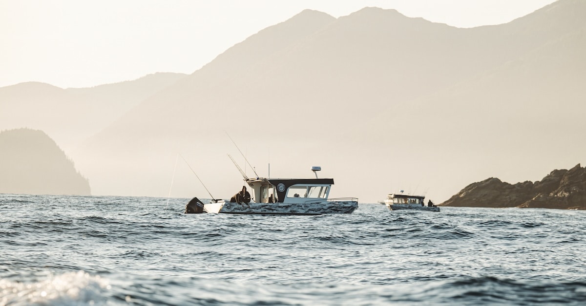 A custom-built Outlaw Eagle boat from Sandspit Adventures navigating the ocean swells of Cartwright Sound in Haida Gwaii