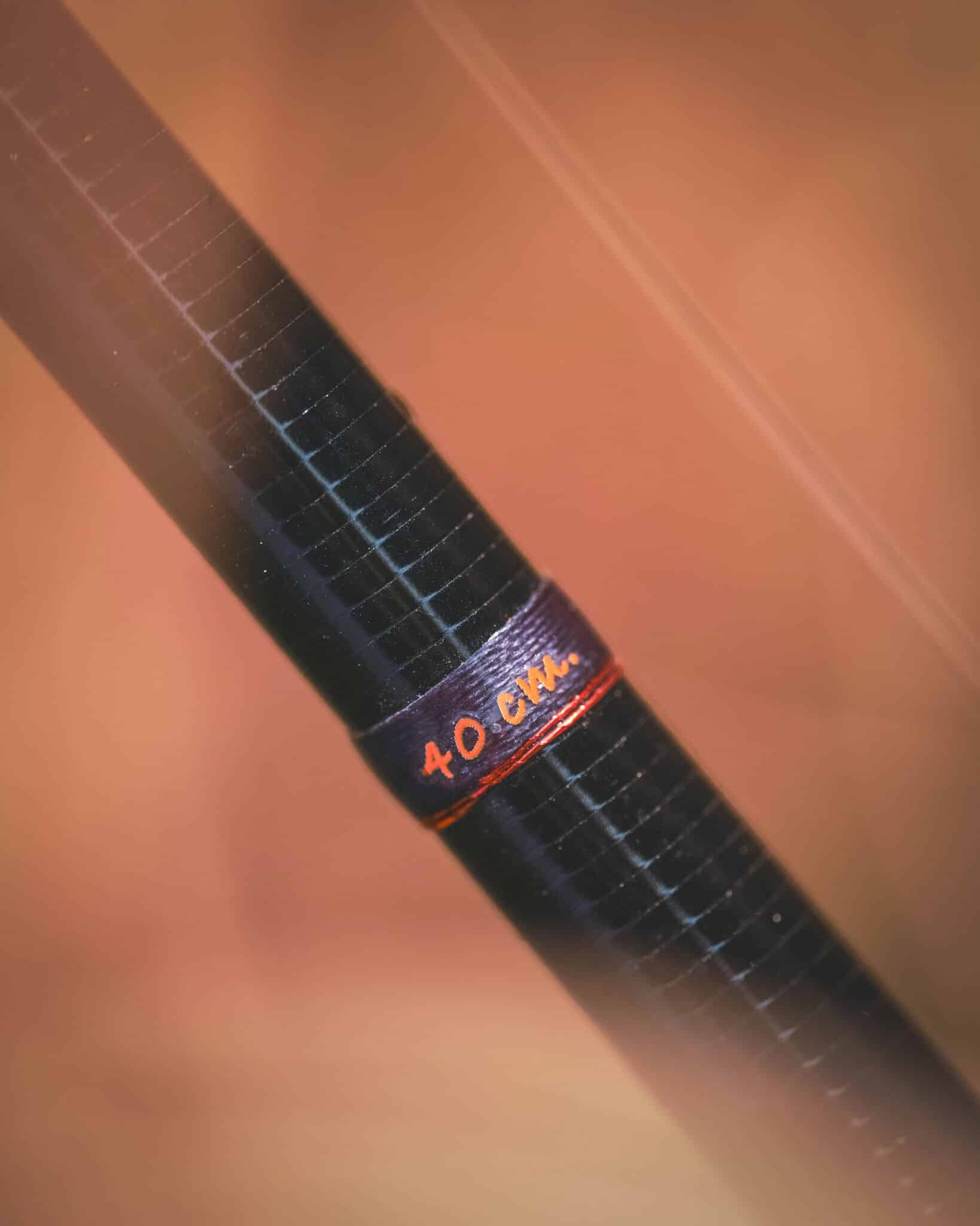 A Stillmaniac Review & Pilgrimage: Fly Fishing for Coastal Cutthroat Trout in Powell River Macro view of the built-in orange 40 cm fish measurement mark on the raw Vision Stillmaniac fly rod blank