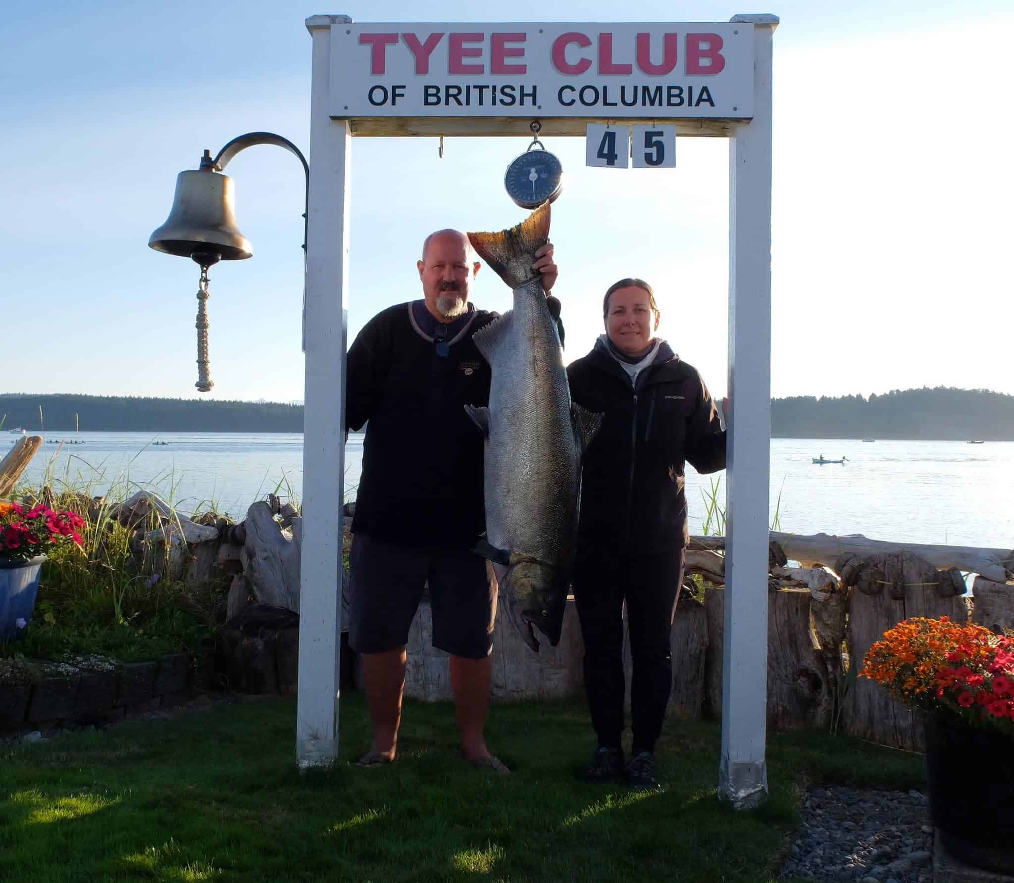 April Davis and Greg Askey with the first 45.25 lb Tyee salmon of 2026 at the Tyee Club scale