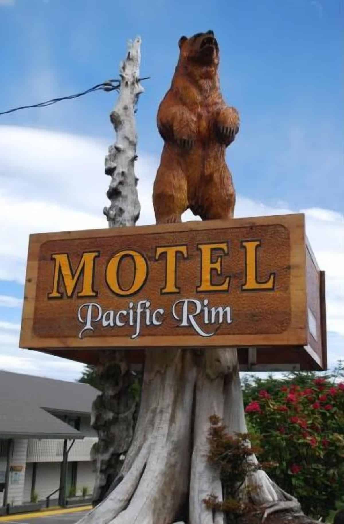 Quiet Comfort: Pacific Rim Motel in Ucluelet Hand-carved wooden bear sign marking the entrance of the Pacific Rim Motel in Ucluelet.